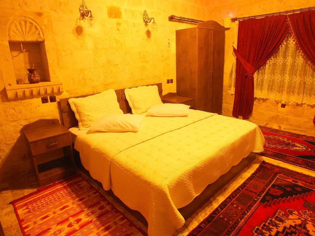 Dilek Tepesi Cave Hotel Ayvali Quarto foto