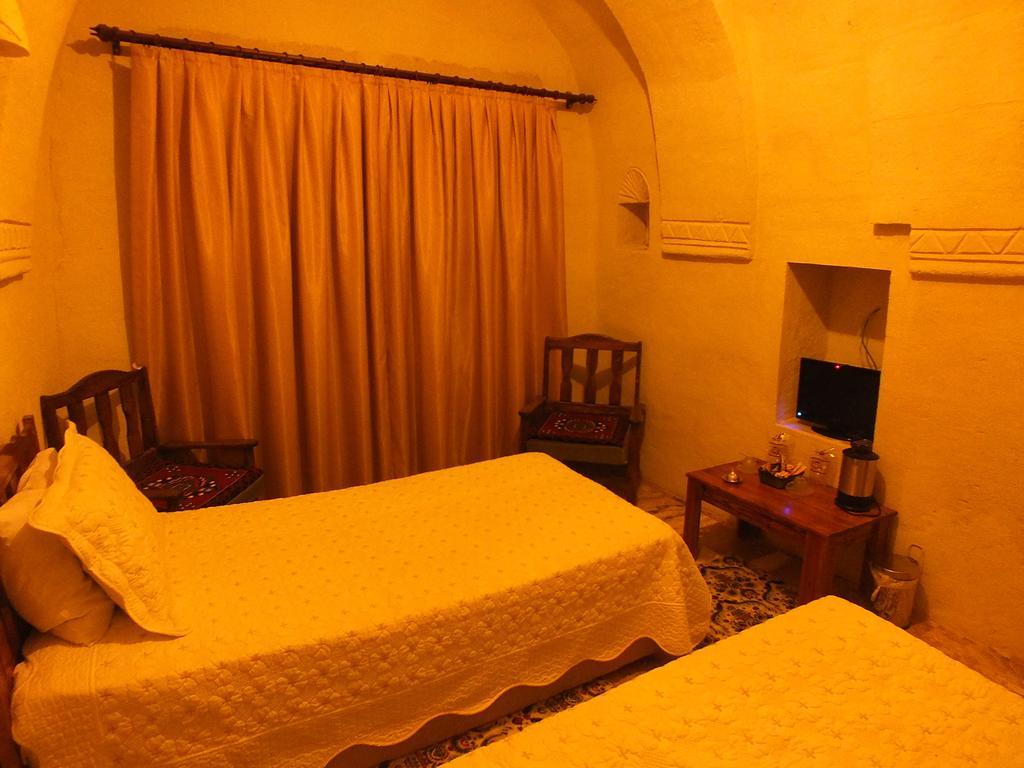 Dilek Tepesi Cave Hotel Ayvali Quarto foto