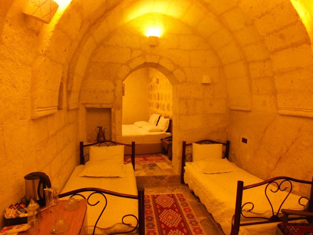 Dilek Tepesi Cave Hotel Ayvali Quarto foto